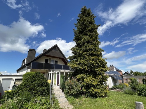 Sicht aus dem Garten - 4.5 Zimmer Einfamilienhaus in Giesen