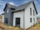 Seitenansicht - Einfamilienhaus mit 193,00 m&sup2; in Bad Salzdetfurth zum Kaufen