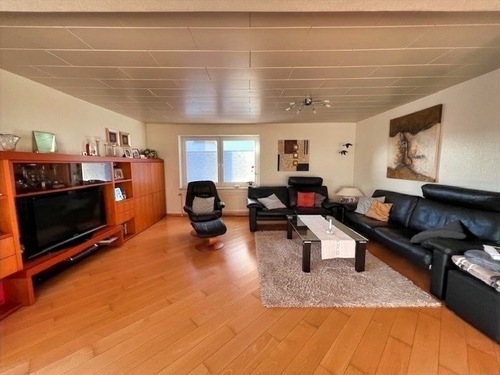 Gemütliches Wohnzimmer - Einfamilienhaus mit 140,00 m&sup2; in Alfeld zum Kaufen