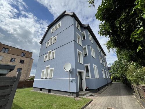 Giebelseite/Eingangsbereich - Erdgeschoßwohnung mit 88,00 m&sup2; in Sarstedt zum Kaufen