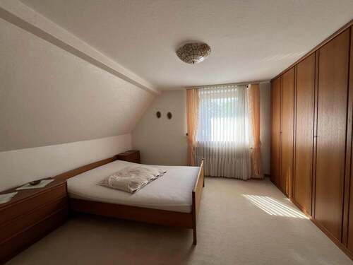 Schlafzimmer im Dachgeschoss - 