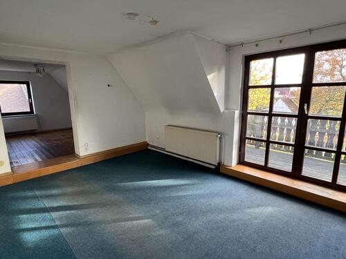 Wohnzimmer OG mit Balkonzugang - 