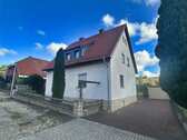 Straßenansicht - Einfamilienhaus mit 130,00 m² in Alfeld zum Kaufen