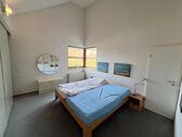 Schlafzimmer mit Ankleide (DG). - 