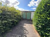 Garage mit Zugang zum Garten - 