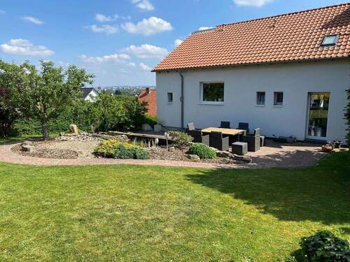 Gartenansicht - Einfamilienhaus mit 144,00 m&sup2; in Hildesheim zum Kaufen