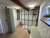 Bad mit ebenerdiger Dusche - 