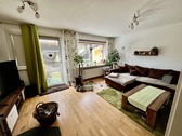 Wohnzimmer mit Kamin (EG) - Reihenmittelhaus mit 95,00 m&sup2; in Hildesheim zum Kaufen