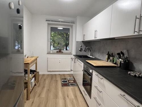 Küche mit Einbauküche - 