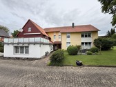 Hausansicht - Mehrfamilienhaus, Wohnhaus mit 455,00 m&sup2; in Sibbesse zum Kaufen
