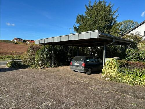 Carport und Stellplätze - 