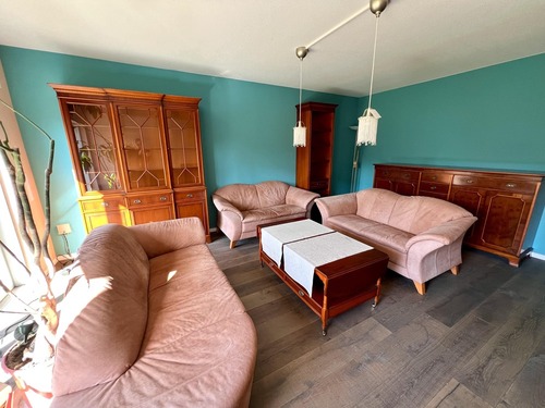 Modernes Wohnzimmer - Bungalow mit 93,50 m&sup2; in Alfeld zum Kaufen