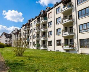 **RESERVIERT** Ansprechende 3-Zimmer-Eigentumswohnung mit Sonnenbalkon und Tiefgaragenstellplatz in Bad Homburg vor der Höhe – Ober-Eschbach