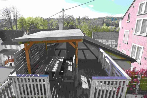 Terrasse zwischen Garten und Haus - 