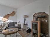 echter Kamin im Wohnzimmer - 3 Zimmer Etagenwohnung in Biederitz