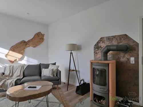 echter Kamin im Wohnzimmer - 3 Zimmer Etagenwohnung in Biederitz