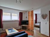 Blick zu TV und Schlafbereich - 2 Zimmer Etagenwohnung zur Miete in Göttingen