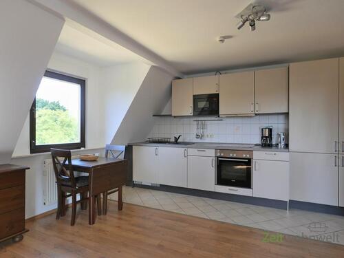 Einbauküche und kleiner Esstisch - Etagenwohnung mit 55,10 m² in Coswig zur Miete
