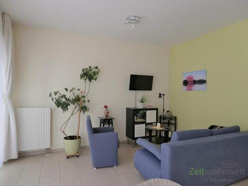 Sitzecke mit TV - (EF1142_M) Erfurt: Altstadt, neu möblierte Wohnung mit Terrasse und ruhigem Schlafzimmer, TG-Stellplatz möglich