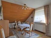 Esstisch im Wohnzimmer - Etagenwohnung mit 80,00 m² in Lohfelden zur Miete