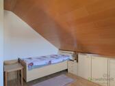 Bett im Schlafzimmer - 