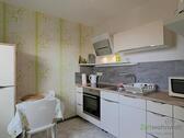 Blick in die Küche - 1 Zimmer Etagenwohnung in Ilmenau