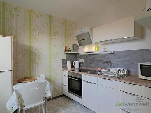 Blick in die Küche - 1 Zimmer Etagenwohnung in Ilmenau
