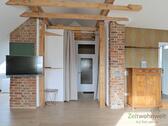Blick zu TV und Eingang - 1 Zimmer Etagenwohnung zur Miete in Schauenburg