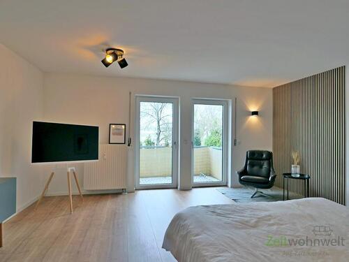 Blick in den Wohnraum - (EF0988_M) Dresden: Friedrichstadt, nagelneu möbliertes, ruhiges Apartment mit Balkon und PKW-Stellplatz, WLAN inkl.