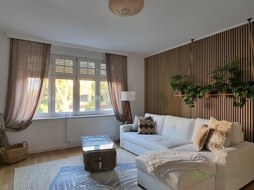 Blick ins Wohnzimmer - (EF1208_M) Magdeburg: Biederitz, komfortabel möblierte Wohnung mit Wohnküche, Parkettböden und Kamin