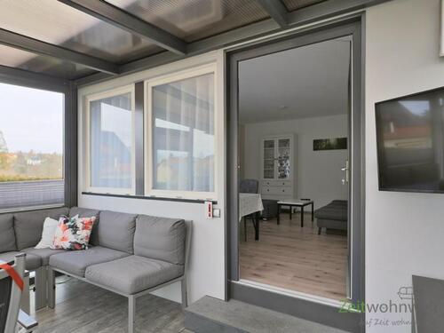 Blick vom Wintergarten ins Wohnzimmer - Etagenwohnung mit 47,00 m&sup2; in Dresden zur Miete