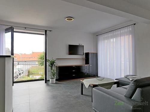 Wohnbereich mit TV - (EF0703_M) Erfurt: Ermstedt, neu gebaute und möblierte 2-Zimmer-Wohnung in ruhiger Lage, WLAN, Full-Service