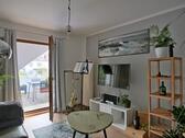 Blick ins Wohnzimmer - (EF1063_M) Kassel-Stadt: Kirchditmold, preiswerte möblierte Dachgeschosswohnung mit Balkon in ruhiger Randlage