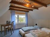 Dachzimmer moit Gästebetten - 