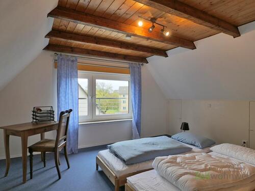 Dachzimmer moit Gästebetten - 
