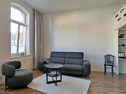 Sofa-Sitzecke im Wohnzimmer - 2 Zimmer Etagenwohnung in Eisenach