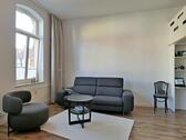 Sofa-Sitzecke im Wohnzimmer - 2 Zimmer Etagenwohnung in Eisenach