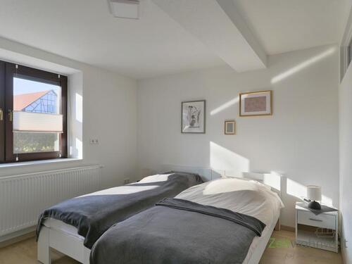 Blick ins Schlafzimmer - Etagenwohnung mit 65,00 m&sup2; in Alkersleben zur Miete