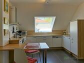 Küchenbereich mit Esstisch - Etagenwohnung mit 65,00 m&sup2; in Moritzburg zur Miete