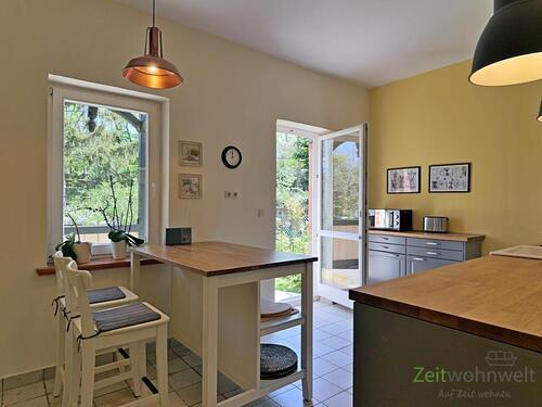 Küche mit Gartenausgang - 