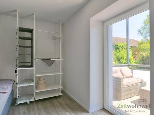 Bett-Wandregal und Balkonausgang - Etagenwohnung mit 55,00 m² in Irxleben zur Miete