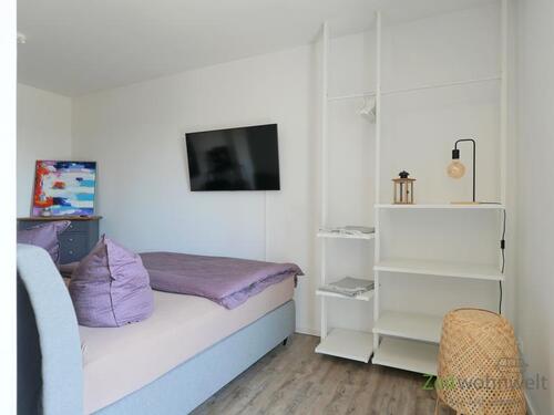 Wand-TV und modernes Regal - Etagenwohnung mit 55,00 m² in Irxleben zur Miete