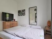 Doppelbett und TV - 