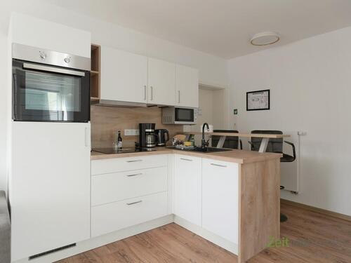 moderne Einbauküche mit Tresen - Etagenwohnung mit 50,15 m² in Eisenach zur Miete