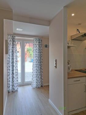 bodentiefes Fenster zum Innenhof - 1 Zimmer Etagenwohnung in Jena