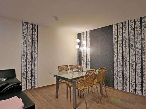 Esstisch im Wohnzimmer - 2 Zimmer Etagenwohnung in Klettbach