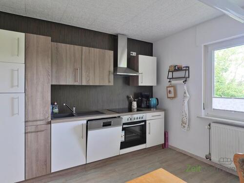 Blick in die Küche - Etagenwohnung mit 68,00 m&sup2; in Nüsttal zur Miete