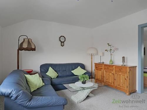 Wohnzimmer mit zwei Sofas - Etagenwohnung mit 76,00 m&sup2; in Northeim zur Miete