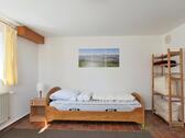Blick zum Bett - 1 Zimmer Etagenwohnung in Schlitz