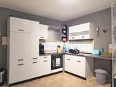 Blick zur Einbauküche - 1 Zimmer Etagenwohnung zur Miete in Flieden